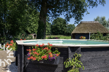 031 Sfeervol 4 persoons appartement met een hottub in de tuin in Nieuw Heeten