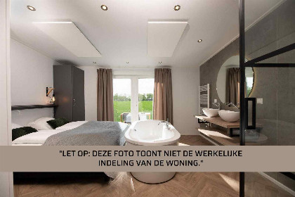 009 Luxe 2 persoons wellnesslodge met bubbelbad, sauna en sunshower