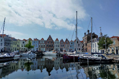 015 Prachtige 4 persoons vakantiewoning met een ruime tuin en een Pipowagen in Baarland