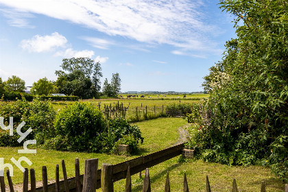 014 Comfortabel 4 persoons vakantiehuisje met weids uitzicht op de duinen in Buttinge