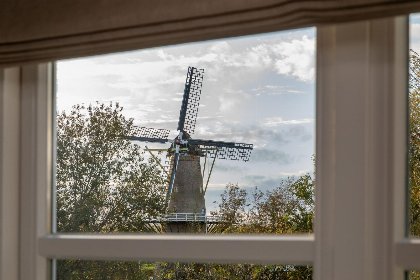 041 Uniek overnachten in 16e eeuwse 'Boerderij Molenhof' met riante tuin | Stationsweg 5 | Heinkenszand