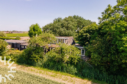 025 Prachtig 6 persoons vakantiehuis met grote tuin en uitzicht op landerijen in Kamperland