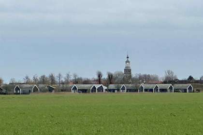 011 Huisje met vrij uitzicht over de polder en gelegen aan de Oosterschelde. Rust!