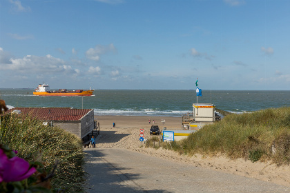 006 Een gezellig 5 persoons wagenhuis met eigen tuin, nabij strand in Dishoek