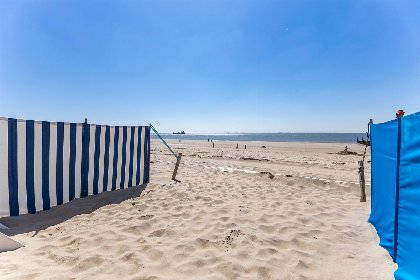 019 Slaapstrandhuisje bij Dishoek direct aan zee met panoramisch uitzicht en terras | 342