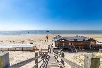 025 Slaapstrandhuisje bij Dishoek direct aan zee met panoramisch uitzicht en terras | 342
