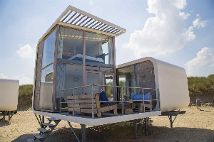 Uniek 6 persoons slaapstrandhuisje op het strand nabij Nieuwvliet Bad