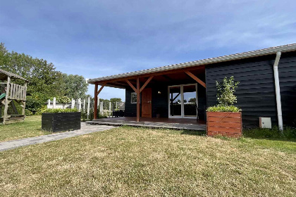 016 Vrijstaande 4 persoons bungalow dichtbij het Noordzeestrand in Renesse