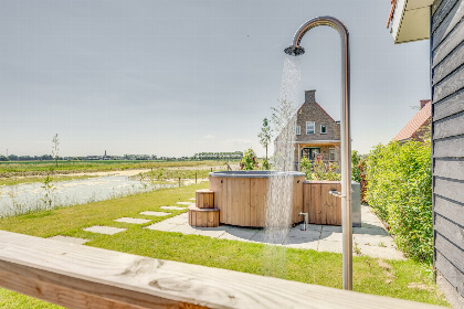 010 Villa voor 7 personen met 2 badkamers, een hottub en Barrel sauna in Ossenisse