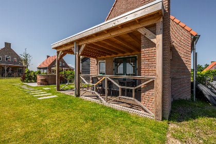 014 Villa voor 7 personen met 2 badkamers, een hottub en Barrel sauna in Ossenisse