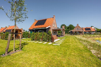 016 Villa voor 7 personen met 2 badkamers, een hottub en Barrel sauna in Ossenisse