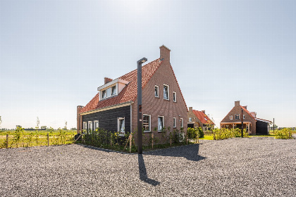 018 Villa voor 7 personen met 2 badkamers, een hottub en Barrel sauna in Ossenisse