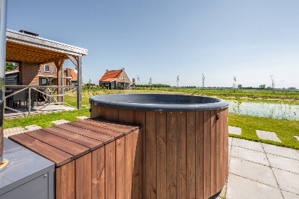 026 Villa voor 7 personen met 2 badkamers, een hottub en Barrel sauna in Ossenisse