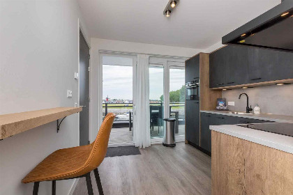 001 4 persoons appartement met een weids uitzicht over het water in Sint Annaland