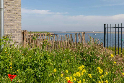 004 Modern 4 persoons appartement met uitzicht over Natuurgebied Nationaal Park Oosterschelde