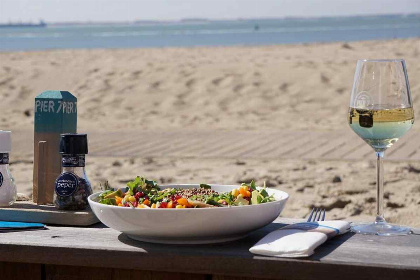 003 Slapen op het strand in een mooi 5 persoons beachhouse in Vlissingen met eigen terras