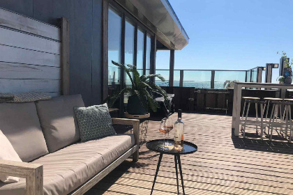 006 Slapen op het strand in een mooi 5 persoons beachhouse in Vlissingen met eigen terras