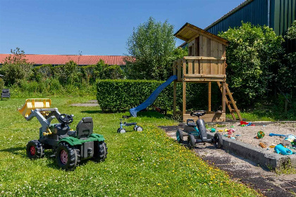 015 Knus 4 persoons beneden appartement in Vrouwenpolder op 30 minuten lopen van het strand