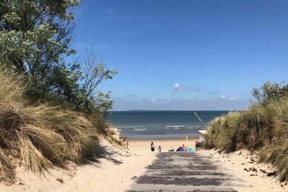 025 Knus 4 persoons beneden appartement in Vrouwenpolder op 30 minuten lopen van het strand