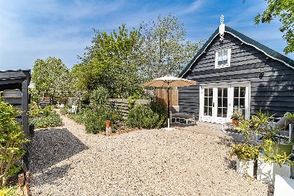 028 Vakantiewoning Vrouwenpolder | lichte moderne woning met grote tuin voor 4 personen | Schoolstraat 6A