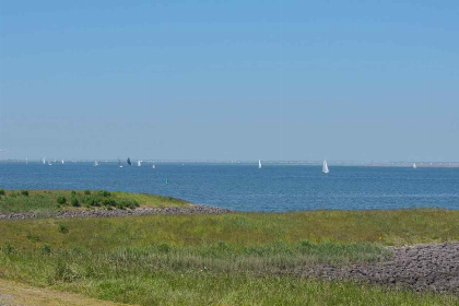 020 Comfortabele 4 persoons vakantiewoning aan het water in Wemeldinge aan de Oosterschelde