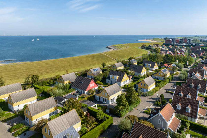 034 Comfortabele 6 persoons vakantiewoning met royale tuin en veranda