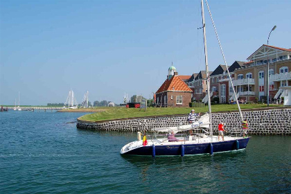 031 Mooie sfeervolle 8 persoons woning op 100 meter van Oosterschelde met hottub en sauna