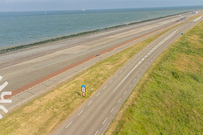 023 Knus 4 persoons vakantiehuis direct onder aan de zeedijk en in de badplaats Westkapelle