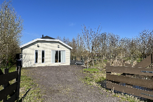 Vrijstaande 4 persoons chalet aan het water bij Alphen aan den Rijn