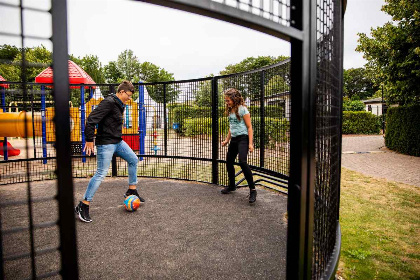 018 5 persoons chalet op vakantiepark Noordwijkse Duinen met zwembad en internet