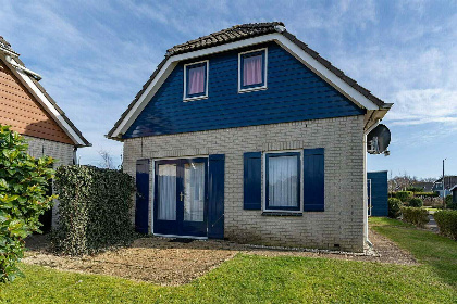 023 Gezellig 6 persoons vakantiehuis met grote, omheinde tuin en vlak bij de kust en Ouddorp