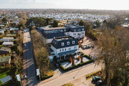 002 Luxe 8 persoons duinvilla met grote tuin aan de Nederlandse kust in Ouddorp