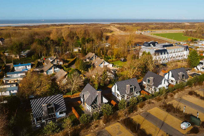 008 Luxe 8 persoons duinvilla met grote tuin aan de Nederlandse kust in Ouddorp