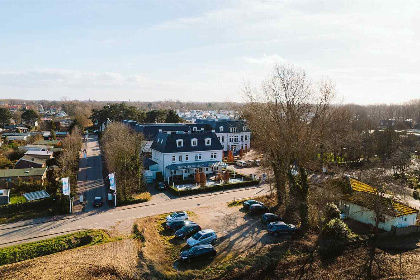 015 Luxe 8 persoons duinvilla met grote tuin aan de Nederlandse kust in Ouddorp