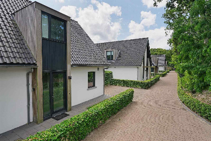 016 Luxe 8 persoons duinvilla met grote tuin aan de Nederlandse kust in Ouddorp