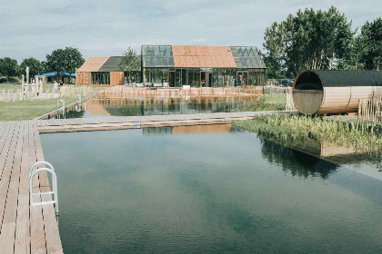 006 Moderne bungalow voor 4 personen vlak bij de kust, de natuur en Ouddorp