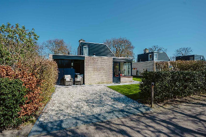 004 Sfeervolle 4 persoons bungalow achter de duinen in Ouddorp, vlakbij Zeeland